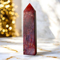 Roter Mondstein Obelisk – warmes Leuchten für Intuition und Leidenschaft