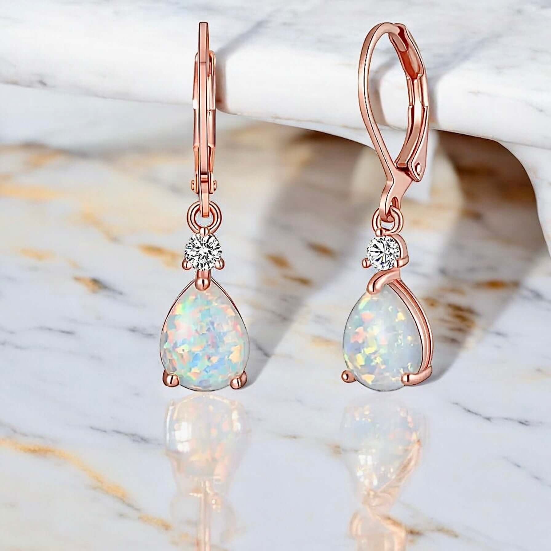 Funkelnde Ohrhänger mit rundem Opal Roségold