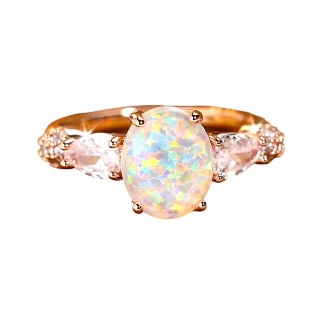 Roségoldener funkelnder Ring mit ovalem Opal