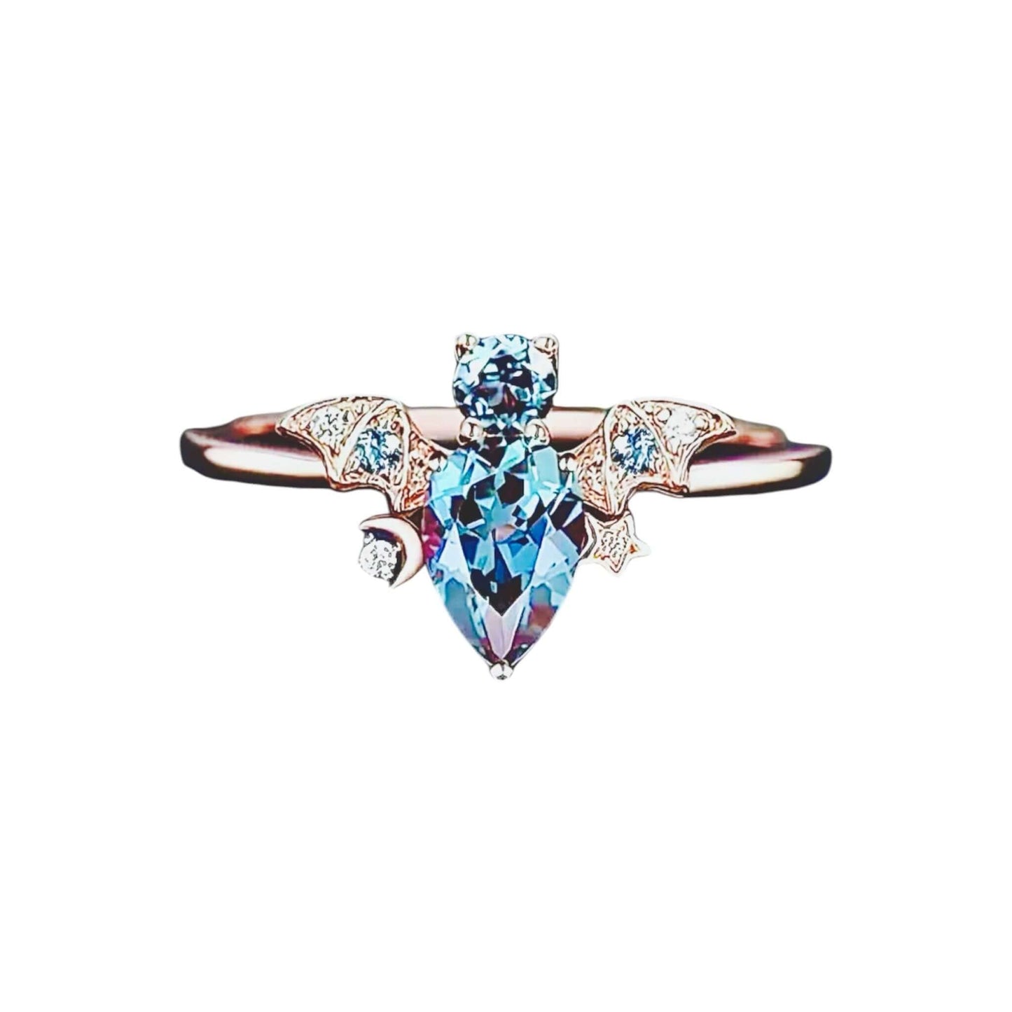 Roségoldener Ring mit funkelnder blauer „Fledermaus“
