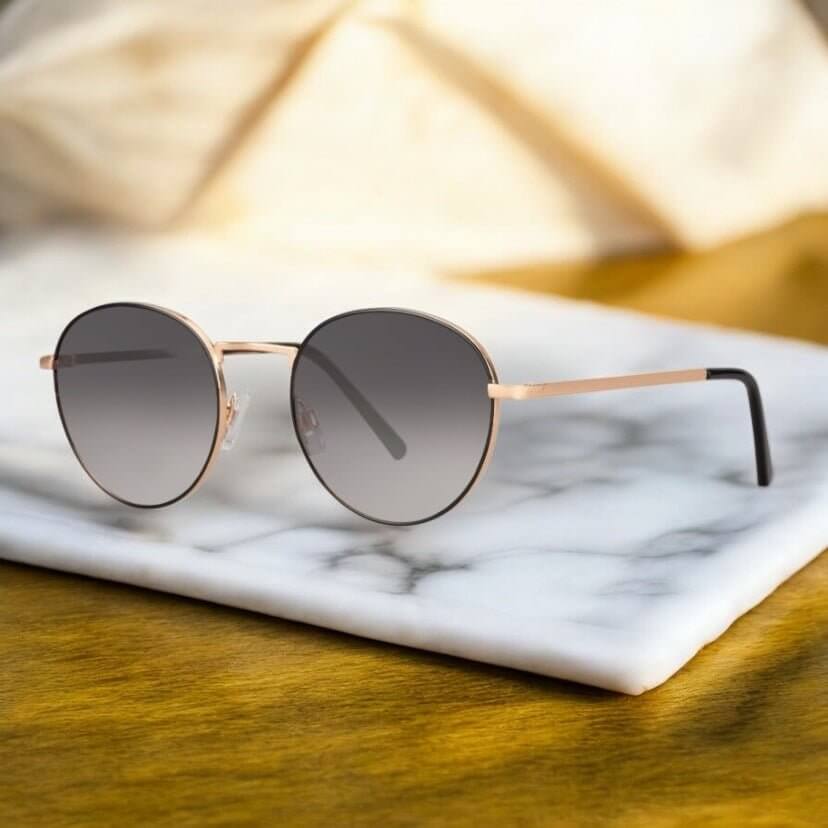 Goldene Sonnenbrille mit schwarzem Verlauf