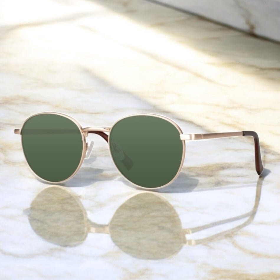 Roségoldene Sonnenbrille mit grünen Gläsern