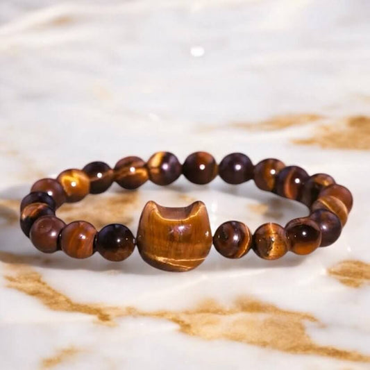 Kugelarmband aus Tigerauge mit Katzenmotiv – Natürliche Kraftquelle für Mut und Ausdauer