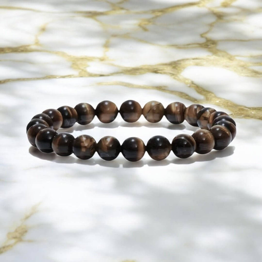 Dunkles Tigerauge Kugelarmband – Kraftvolles Naturjuwel für Schutz und innere Stärke