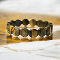Tigerauge Facettenarmband – Warm glänzender Begleiter für Fokus und Selbstbewusstsein