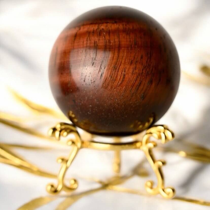 Rote Tigerauge Kugel – edle rote Schattierungen für Inspiration