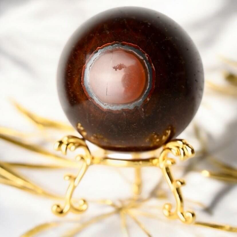 Rote Tigerauge Kugel – edle rote Schattierungen für Inspiration