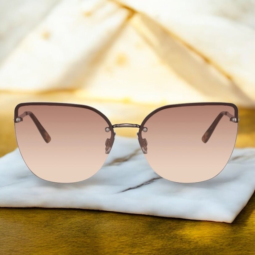 Auffällige Cateye Sonnenbrille in braun - CrystalScents