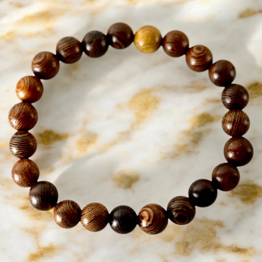 Elastisches Armband mit dunkelbraunen gemaserten Holzperlen - CrystalScents
