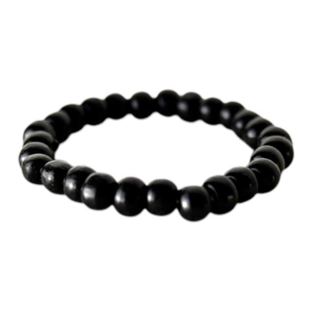 Elastisches Armband mit schwarzen glänzenden Holzperlen - CrystalScents