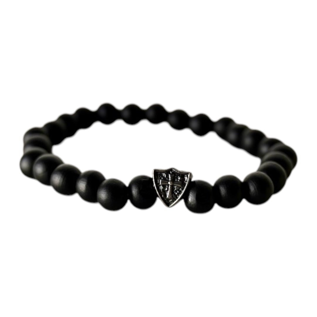 Elastisches Armband mit schwarzen Holzperlen und Schildelement - CrystalScents