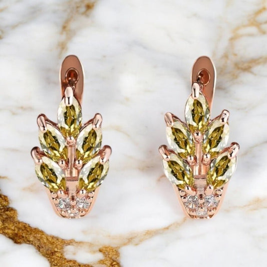 Elegante goldene Kreolen mit Blättern, Champagner - CrystalScents