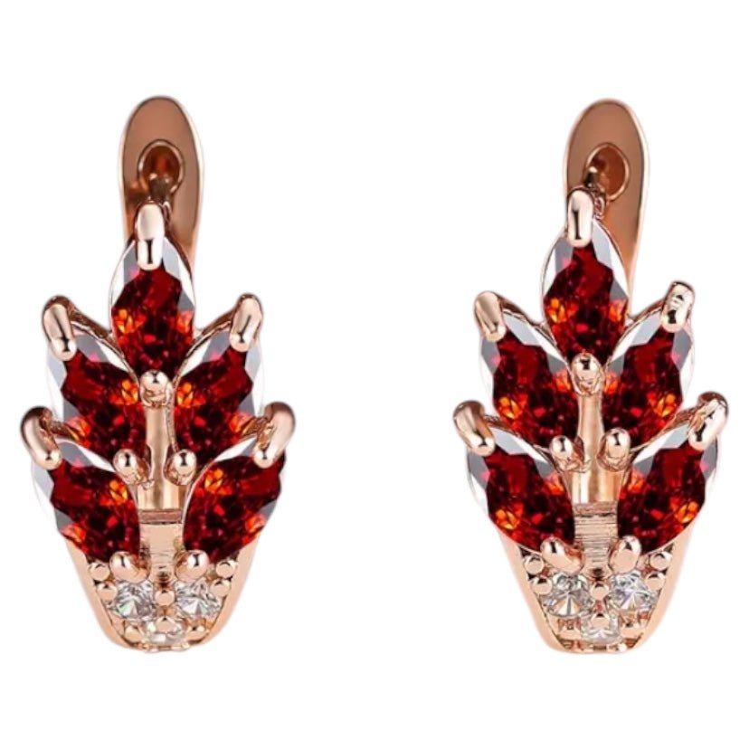 Elegante goldene Kreolen mit Blättern, Rot - CrystalScents