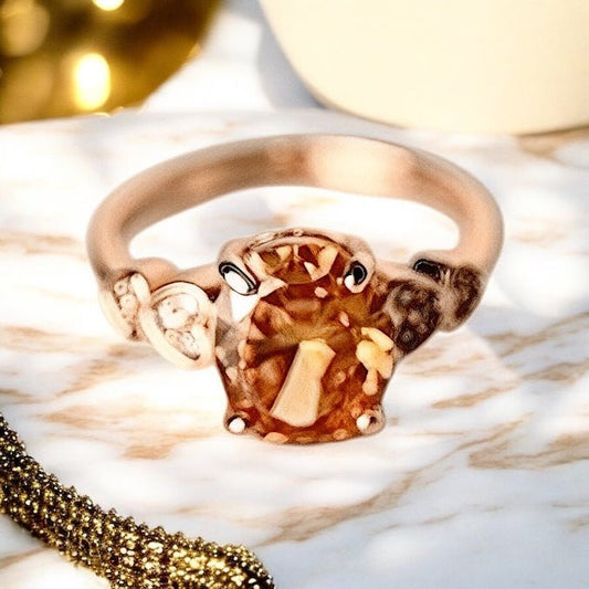 Funkelnder roségoldener Ring mit ovalem Zirkonia - CrystalScents